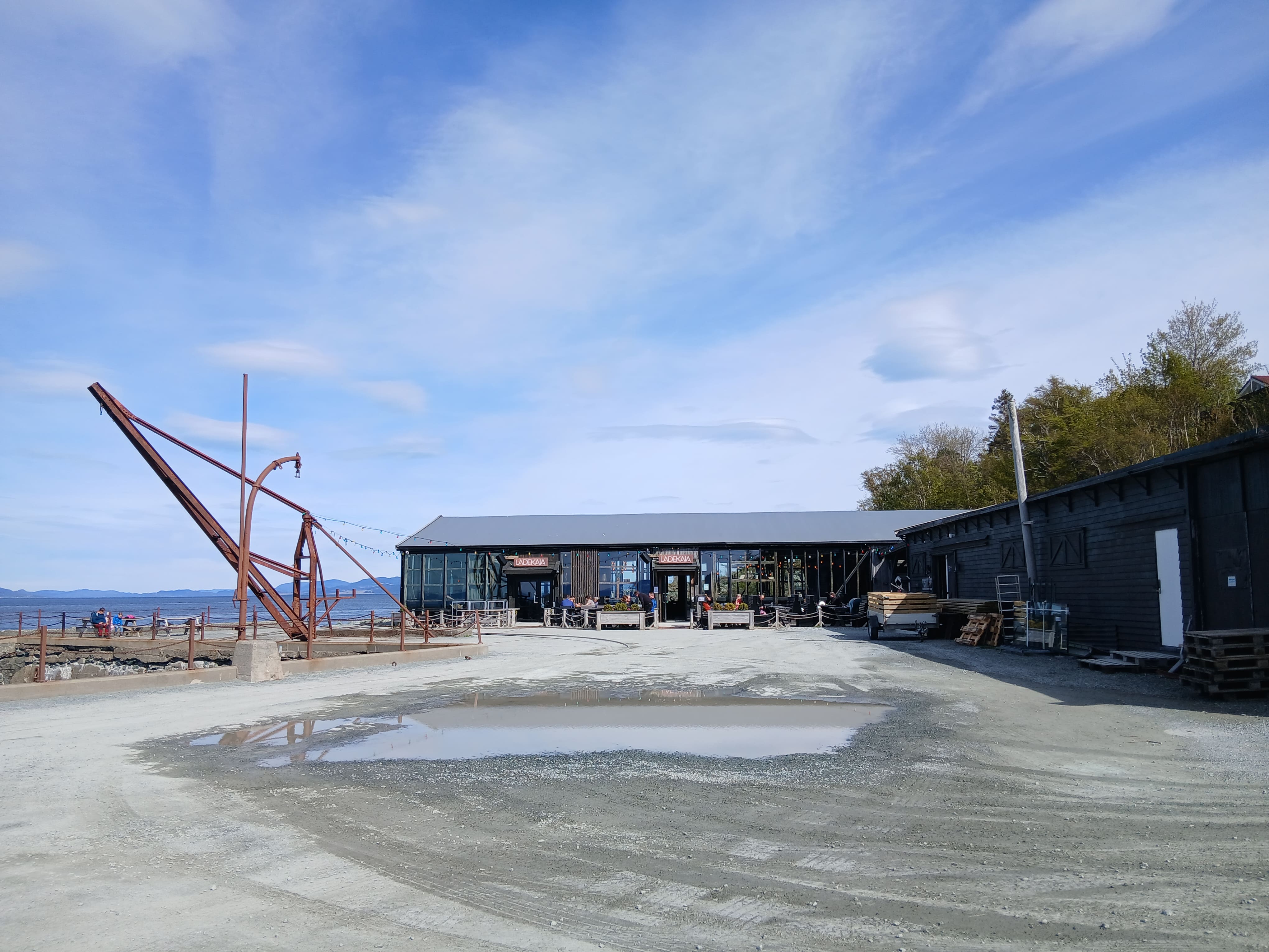 WWII remains with a restaurant in the background
